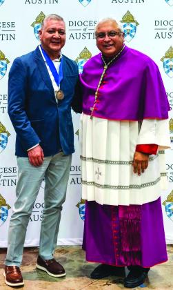Silvestre Barco is on the left, and Bishop Daniel E. Garcia is on the right. Courtesy of Charlotte Spence