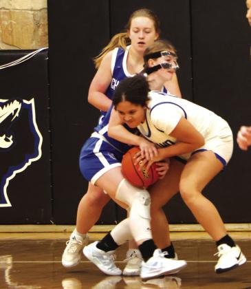 Lady Coyote Amarrea Thomas fighting for the ball in last week’s game against Cherokee Lady Indians. Courtesy of Pam Starr