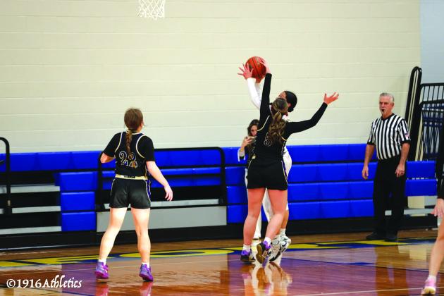 #5 Addy Hay getting a hand on the ball