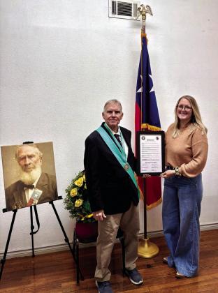 Callie Uptain of the San Saba County Judge’s Office presented the Proclamation declaring April 21st, 2026, as “Sion Bostick Day” to Scott Dunbar, Sion Bostick’s third great-grandson. Photo taken at Pepperbellies.