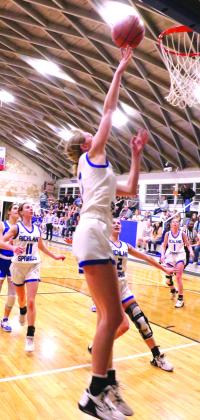 #3 Raegan Wright ( shooting ball) with #11 Rylie Eckert, #1 Lili Appleton, and #2 Ryleigh Bryant