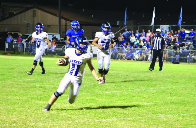 Kenny Triplett #11 carrying the ball down the field in the win over the Indians Friday night. Kenny’s stats: Rushing 2/21 yards; Passing 3/4 - 2 TD; Defense - 5.5 Tackles