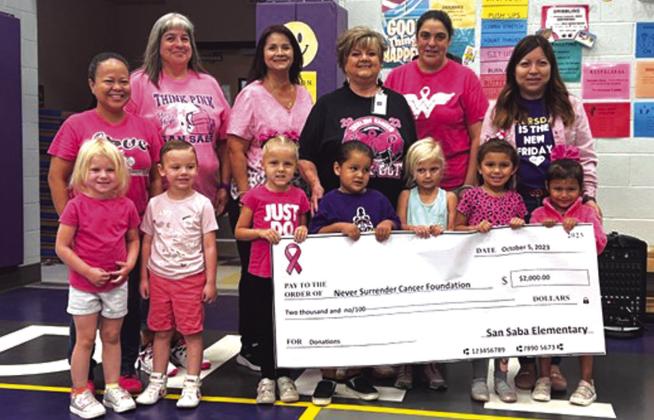 Back row: Mrs. Cooper, Ms. Perez, Mrs. Vasquez, Donna Shahan (Representative for Never Surrender Cancer Foundation), Mrs. Lemaster, Mrs. Martinez Front row: Huntleigh Bohannon, Asher Carrington, Ellie Murphy, Chevelle Vasquez, Lily Fuller, Alycia Davila, Guadalupe Rodriguez. (not pictured PK4 teacher, Ms. Roberts) Courtesy of Dani Gilcrease/SSES Principal