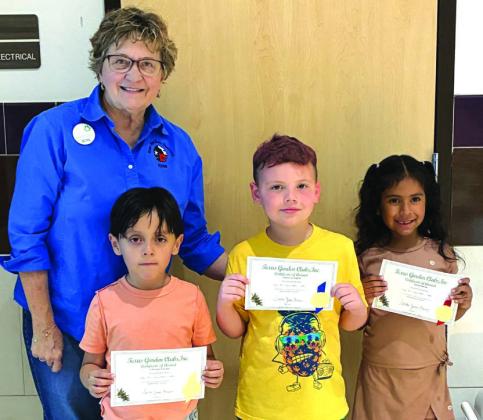 Kindergarten Poetry Contest L-R: Debbie Shahan, SSGC Youth Committee member, 2nd Place - Yaretzi Rocha, 1st Place - Asher Carrington, 3rd Place - Christian Estrada
