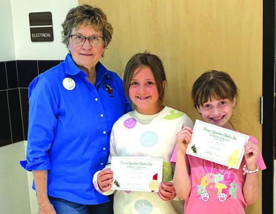 L-R: Debbie Shahan (SSGC Youth Committee member); Grade 3 Woodsey Owl Poster Contest: 2nd Place - Emily Walters; Grade 3 Smokey Bear Poster Contest: 3rd Place - Harper Stephens