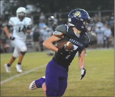 Courtesy of Rita Boultinghouse Haiden Van Bibber (7) runs for extra yards after a catch.