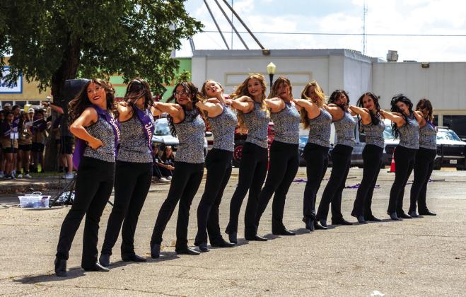 Drill team members perform the “Can-Can” at SSHS homecoming pep rally held downtown Friday, Sept 25th.