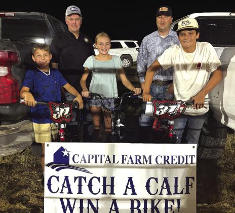 Friday Calf Scramble winners - Asher Little, Georgia Broyles, Mason Rogers