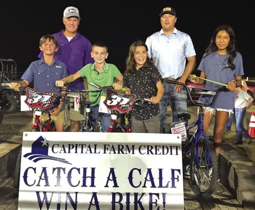 Saturday Calf Scramble winners - Marcus Wood, Cash Reyes, Hugh Hensley, Arleni Castillo Photos courtesy of Capital Farm Credit