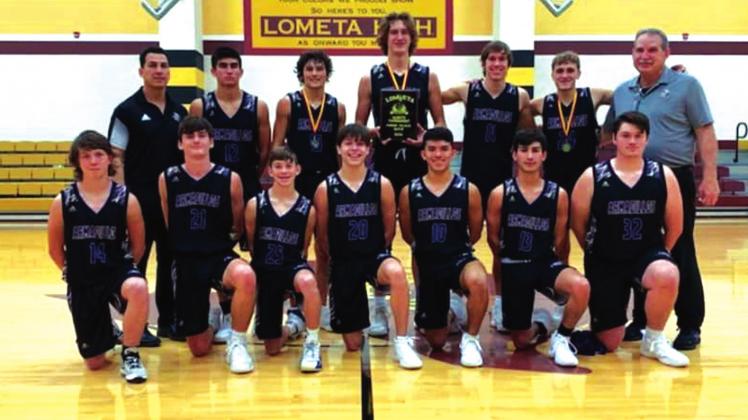 Members of the San Saba High School boys varsity basketball team pose on Saturday, December 4th, after the Dillos won the Lometa High School Tournament. (Photo courtesy of San Saba All-Sports Booster Club)