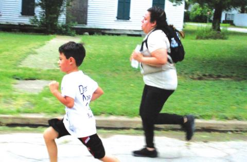 Serious runners in the “Stan Weik Stomp Out Cancer Fun Run”