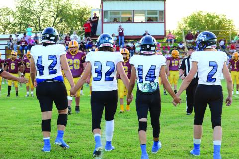 Coyote Captains at the game last Friday night, September 9th, as they band together against Lometa: #42 Jeremiah Beam, #32 Cohen Tharp, #14 Brandon Stewart, and #2 Keston Lusty.  Photo by Pam Starr
