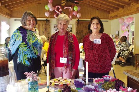 January entertainment hostesses (l-r): Susan Kissko, Sarah Lott, and Jan Beaver (chair)