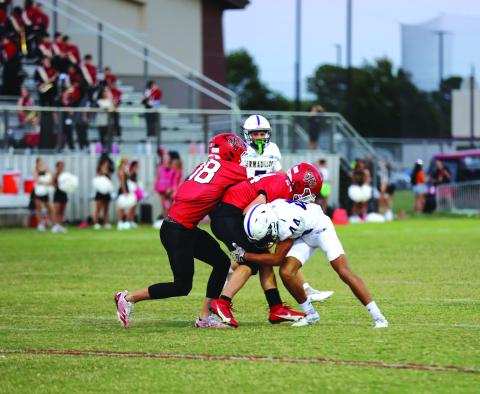 #44 Noel Vega makes a stop midfield for the Armadillos in their win against Katy.