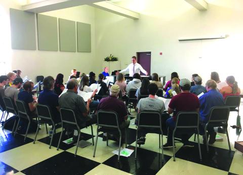 Cutline: The Brownwood Community Choir, led by HPU’s Dr. Christopher Rosborough (center)