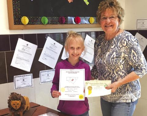 Pictured above : Erin Eudy, 4th grader, and Debbie Shahan, SSGC member Photo by Kelley Cash