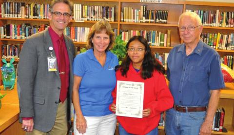Pictured left to right are: HS Principal, Scott Snyder, Rotarian President Jacqueline Carlson; Rotary Student of the Month, Dana Luna; and Rotarian and teacher, Jerry Blankenship.