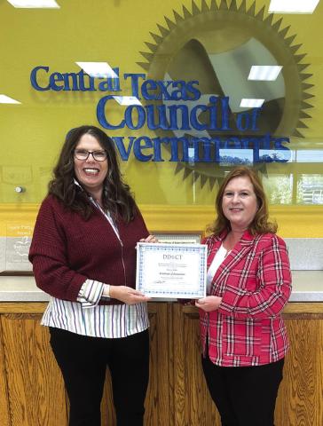 Chamber Executive Director Regina Baker receives award