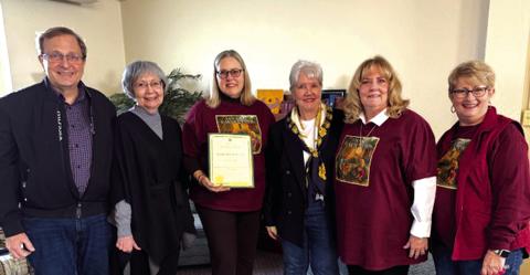 Pictured in this presentation photo are Scott Kroeger, Claire Kroeger, Cindy Sloan, Denise Hilburn, Marjean Alexander, and Trudy Hughes. Courtesy of Cynthia Sloan