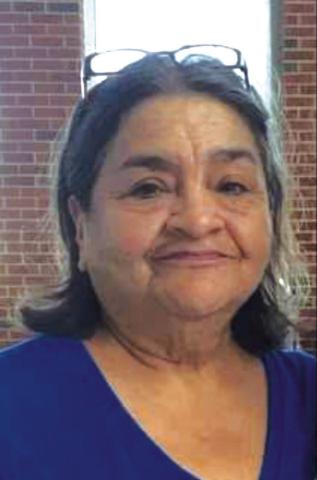 Suelena “Sue” Flores Huron