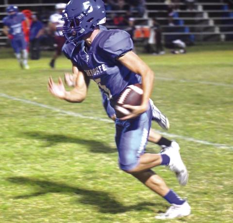 Jaylen Ethridge runs the ball down the field.