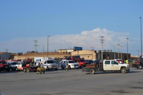 Emergency personnel used the Walmart parking lot as a staging area to access the damage from the tornado. Photo by Matt Caban