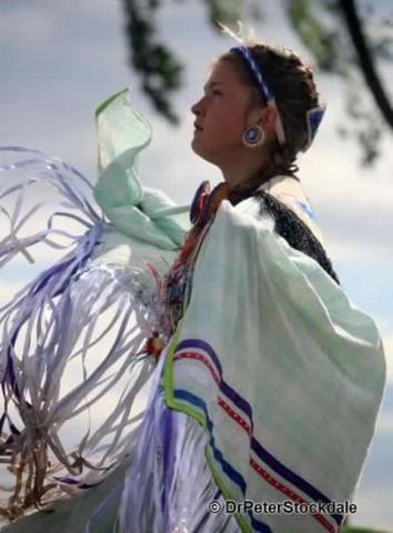 Ashley Meness (Sue's niece) representing Canada as an Algonquin Hoop Dancer on Canada Day. Photo by Dr. Peter Stockdale