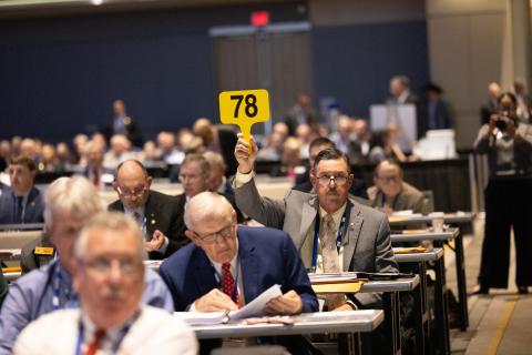 Texas Farm Bureau had 28 voting delegates among the 348 delegates at the AFBF business session in San Antonio. TFB President Russell Boening raises his hand to address the delegate body.