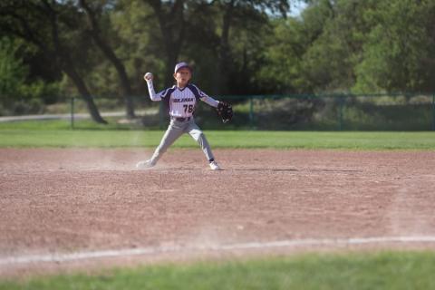 Asher Smith makes a throw from second base