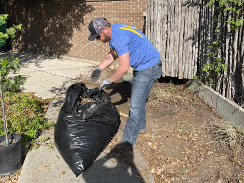 An LCRA employee cleans up landscaping at Rylander Memorial Library in San Saba during LCRA’s Steps Forward Day on April 11. During the annual day of service, employees worked on 40 community projects throughout LCRA’s service territory. 