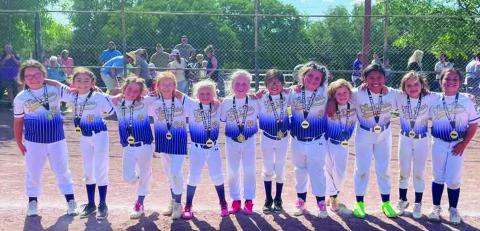 8U White Lady Dillos from left to right: Kailynn Cisneroz, Elizabeth Gonzalez, Faith Dobbs, Chloe Cooley, Vivian Theis, Gentry Bohannon, Arisbel Paez, Teagan Borel, Abigail Fuller, Analia Aragon, Paxley Weeks, and Morgan Huff (not pictured: Lillian Fuller). Coaches are Head Coach - PJ Fuller; Assistants - Jack and Rosie Huff, and Will Cooley. Courtesy of Jessica Fuller