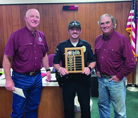 San Saba Police Officer Ty Mann was chosen as the Employee of the Month for June. Taking part in the presentation were City Manager Scott Edmonson (left) and Alderman Robert Whitten (right) Photo by Scott Glaze