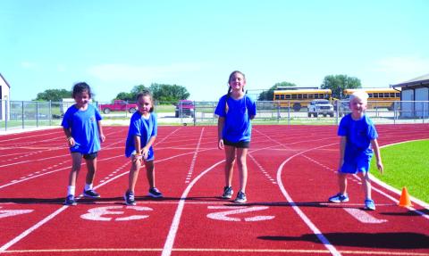 Cherokee ISD first graders Alex Rocha, Cynthia Wisdom, Aislynn Trinidad, and Dallas Bryan getting ready to run at Field Day in Zephyr Photo courtesy of Valerie Valdez