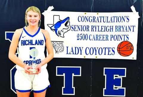 Ryleigh Bryant received 2,500 career points before her last game in the Coyote gym. Photo Courtesy of Pamela Star, RSISD