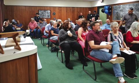 This is only part of the standing-room only crowd of over 45 folks who attended the July 8th City Council Meeting. Photo by Djuana Payton