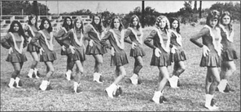 HEY! LOOK ME OVER––Members of the Cherokee Drill Team pose for this picture on the home field as everyone was preparing for the introduction of King Football in San Saba County. Wearing the Blue and White are Josie Salinas, Dedra Sellman, Sharon Perry, Debbie Perry, Kay Perry, Gale Scott, Sharon Cavness, Cathy Raesener, Kathy Keeney, Sylvia Clopton, Yvone Clopton and Diane Oliver. The Indians won eight out of ten games last year and are looking for another good season.