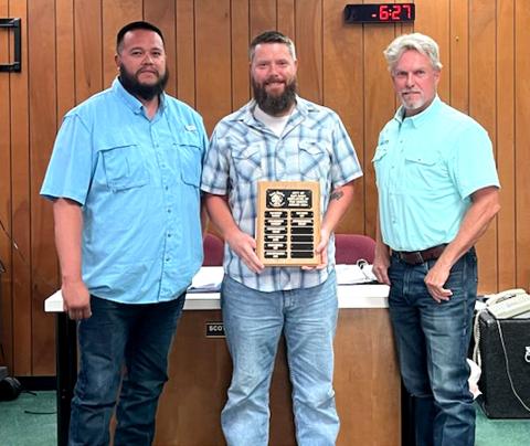 August Employee of the Month Matthew Boswell, employee working in the Sanitation Department, was selected as the Employee of the Month for August. Alderman Marcus Amthor and Sanitation Department Supervisor Juan Montoya presented Matthew with a plaque with his name on it and a gift certificate to a local restaurant during the August 20th City Council Meeting.