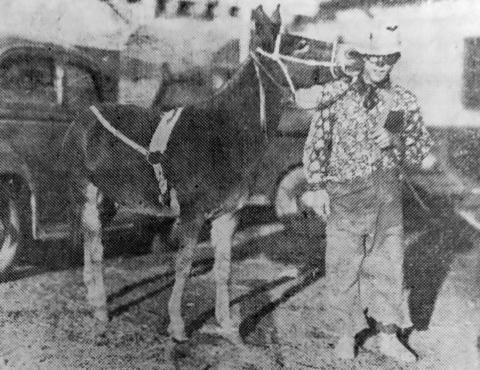 GEORGE TYLER and his Donkey TOBE, the clown and donkey act of the San Saba Rodeo &amp; War Bond Rally, will make nightly appearances Thursday, Friday and Saturday and will assist the cowboys in fighting the wild Bahama bulls. He has clowned in Chicago; Sidney, Iowa; Cheyenne, Wyoming and many rodeos throughout the north and west.