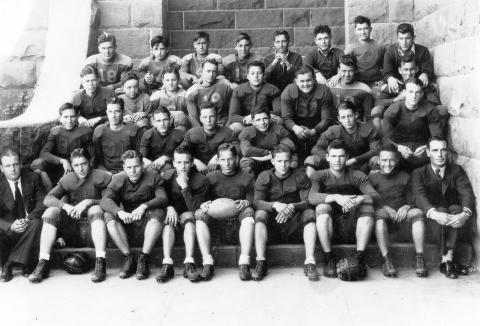 San Saba High School 1936 Football Team - Rusty Carroll is on the front row, third from the right. Fourth from the right on the front row is Dean Bagley, son of R.B. Bagley, and Coach Jack Locklear is on the right end of the first row.