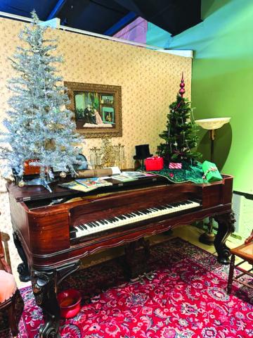 You can almost hear beautiful music from the ornate grand piano inside the 'Parlar' display! Photo by Aileen Roberts