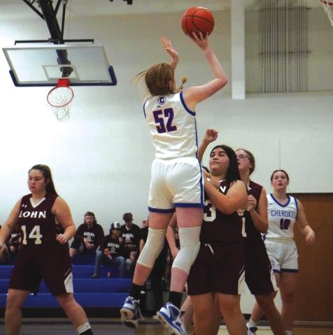 Chloe Berrio getting some air in the Varsity game against Lohn. Photo courtesy of Valerie Valdez