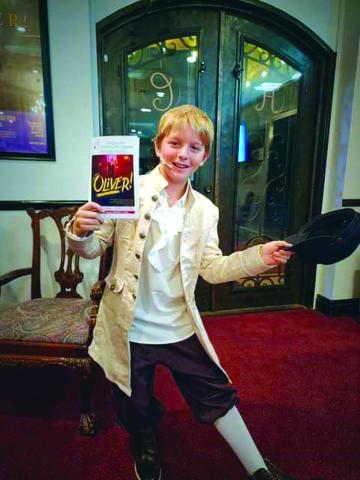 Holdin Boswell is Oliver Twist in the stage production of Oliver Twist