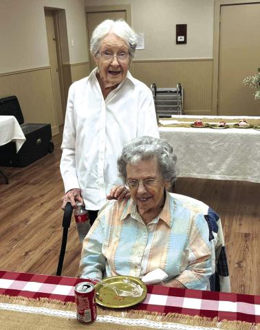 Panzee Fikes (sitting) visited with close friend Vera Ralston before family and friends arrived to celebrate her 95th birthday. Photo courtesy of Barry Fikes