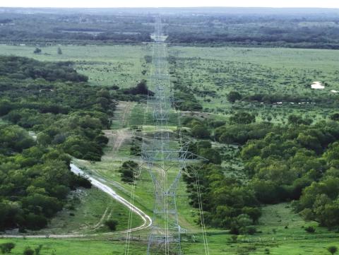 Photo was taken last Saturday SE of San Antonio on a newly constructed transmission line showing habitat fragmentation. This type of structure is similar to the proposed structures for southern San Saba County. This gives you a good idea of how tall the structures are, the multiple lines on the towers, and what you can expect to see once construction is completed. Courtesy of Macy Ledbetter / www.SpringCreekOutdoors.com