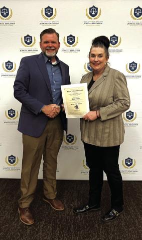 Judge Jody Fauley receiving his award.