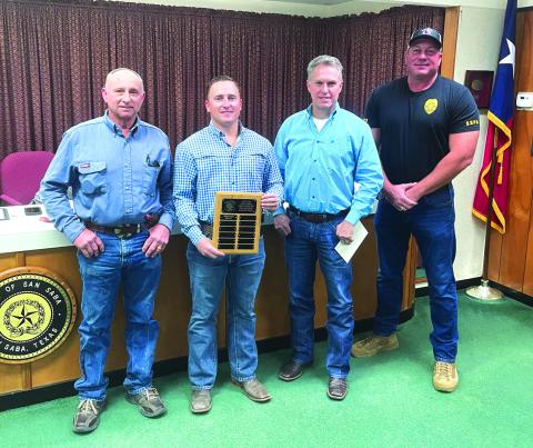 Left to right in the picture are Denver Daniel, Electric Department Supervisor; Jacob Uptain, Electric Department Employee; Alderman Marcus Amthor; and Police Chief John Bauer.