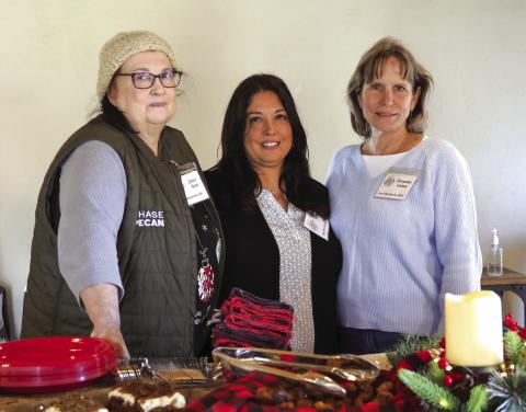 January meeting Hostesses: Janice Bates (chair), Marissa Kilman, and Jacqueline Carlson. Courtesy of Karen Sloan
