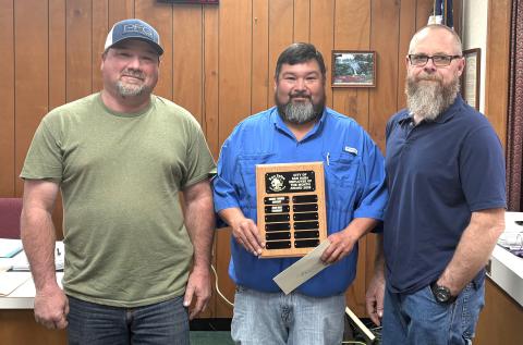 Parks Department employee Juan Diaz was awarded the Employee of the Month award for February. He is pictured here holding a dedicated plaque with his name on it, and he was also given a gift certificate to a local restaurant. Taking part in the presentation were Parks Department Superintendent Chris Stewart (left) and Alderman Michael Nelson (right). Congratulations, Juan! Courtesy of Scott Glaze