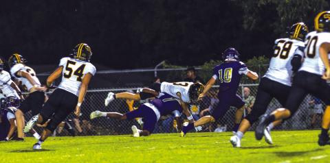 #1 Rome Hatten makes a big tackle for the Dillo defense