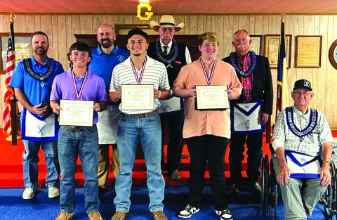 Pictured left to right are Back Row: Jake Lackey, Chris Daniels, Les Hammett, and Frank Pearce; Bottom Row: Winton Lackey, Joel Valdez, Jacob Sweeney, and Row Jones | Courtesy of Jake Lackey